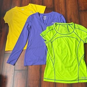 Three Fila MediumVibrant Yellow, Neon Green, and Purple Tees